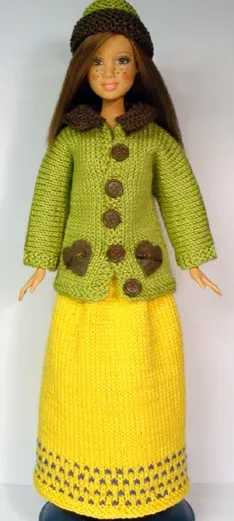 Barbie iklädd grön stickad kofta med bruna detaljer, gul kjol och matchande grön mössa