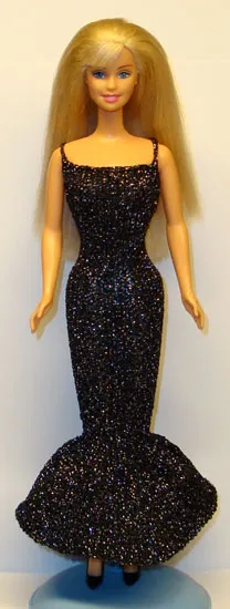 Barbie i svart glittrig festklänning med sjöjungfrumodell och volang.