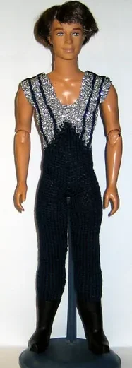 Barbie i mörkblå jumpsuit med silverglittrig v-ringning